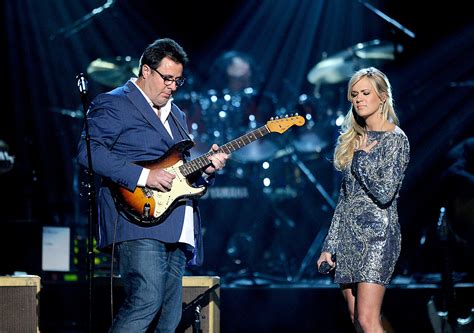 Carrie Underwood and Vince Gill Singing How Great Thou Art: A Deeper Dive into the Dynamic Duo's Collaborations and their Artistic Legacy